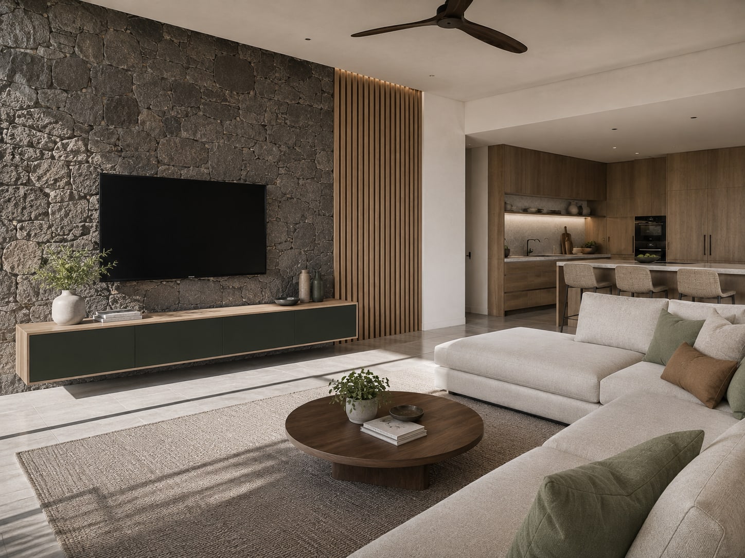 Living room with a basalt stone feature wall, timber batten panel and open kitchen beyond